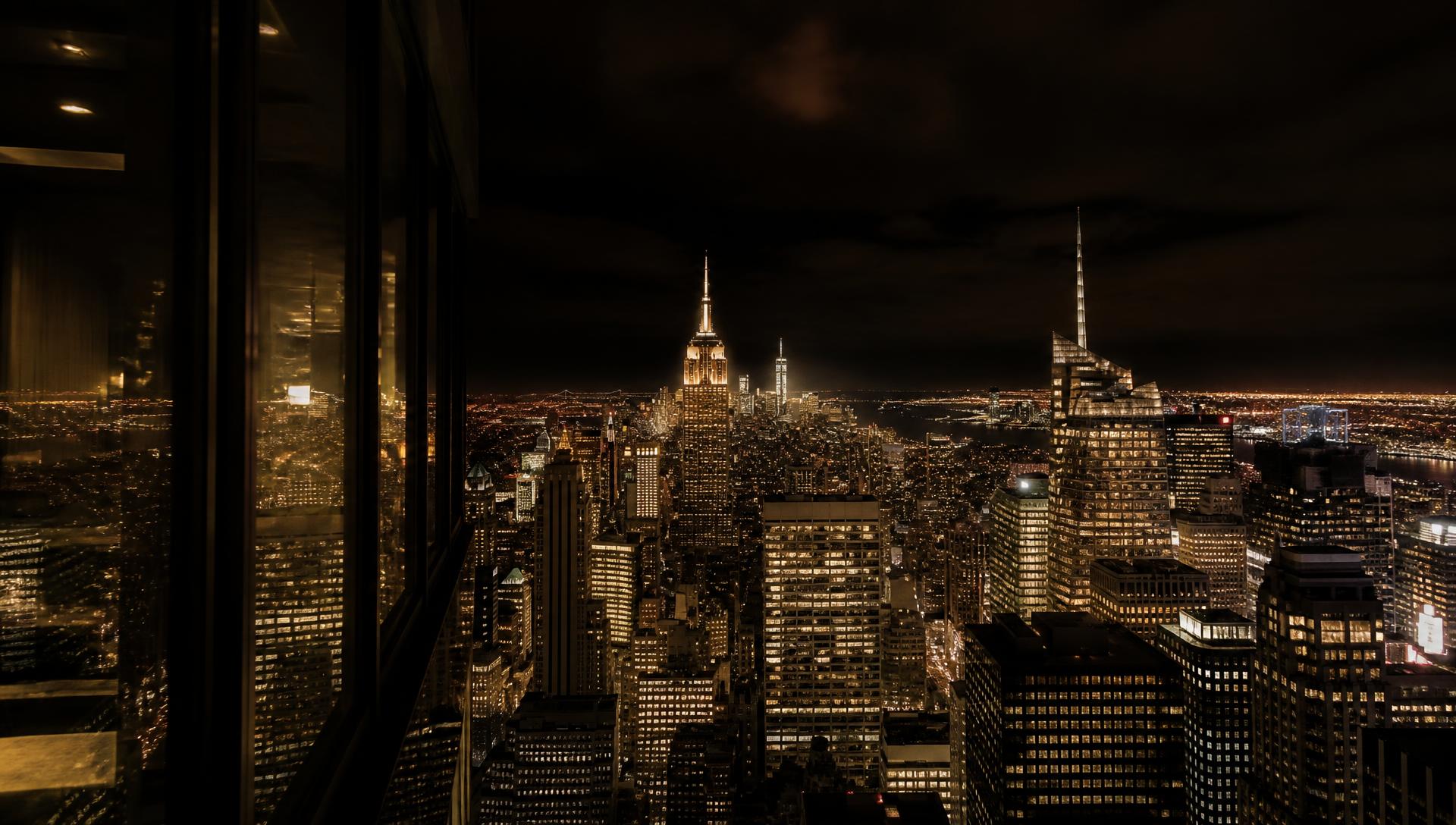 Manhattan skyline glowing at night